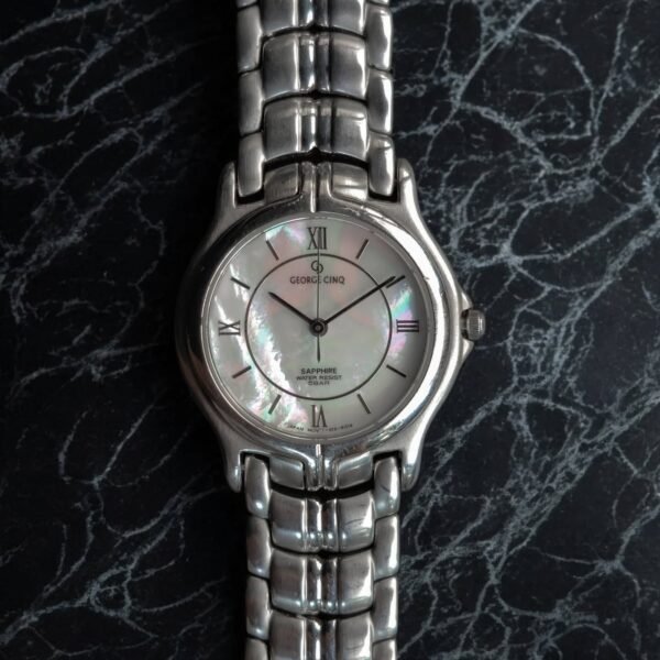 George Cinq – MOP Dial