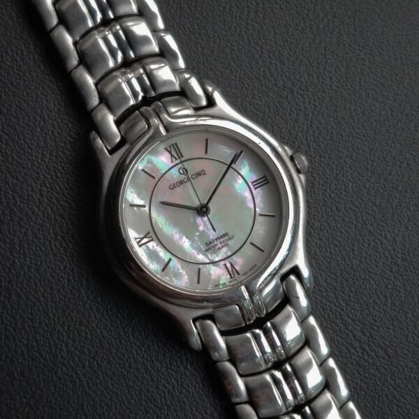 George Cinq – MOP Dial